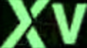 the goddess spreads her cute feet in white socks and jeans on spring grass