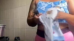 She's flashing her big swollen pussy as an exhibitionist.