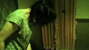 Mature asian woman showcases her talents in an intriguing display.