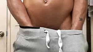 blkdragonboie gets oiled rub down after shower.