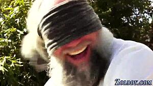 This kinky babe in lingerie sucks the old man's cock so well