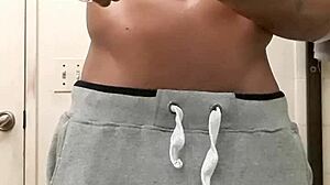 blkdragonboie gets oiled rub down after shower.