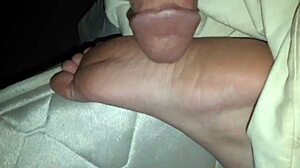 Intense cumshot explodes onto sexy feet