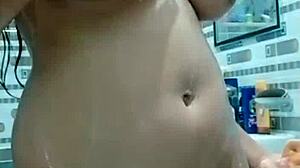 pakistani stepmom in the bathroom using a dildo for anal pleasure