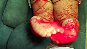Chubby wife in red stockings does footjob for neighbor, pov close-up, while husband travels