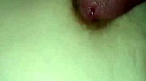 Gretala rubs dick on her tits