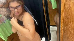 Woman trying on clothes with huge buttplug in hairy pussy and big ass