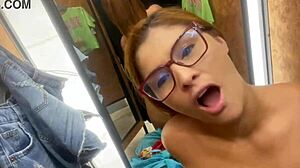 Woman trying on clothes with huge buttplug in hairy pussy and big ass