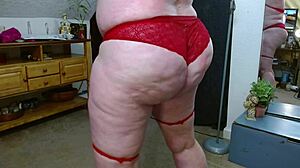 Thick dawnskye1962 is stretching sexily in red lace