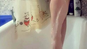 Busty teen intensely washes her perfect feet in the shower