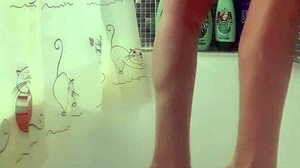 Busty teen intensely washes her perfect feet in the shower