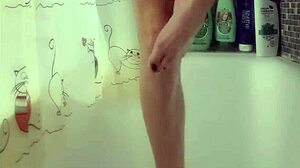 Busty teen intensely washes her perfect feet in the shower