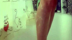 Busty teen intensely washes her perfect feet in the shower