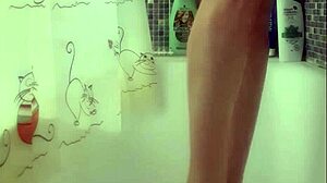 Busty teen intensely washes her perfect feet in the shower