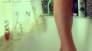 Busty teen intensely washes her perfect feet in the shower