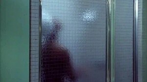 Ebony girl undresses in shower scene from Kolchak.
