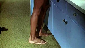 Ebony girl undresses in shower scene from Kolchak.
