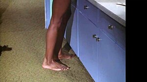 Ebony girl undresses in shower scene from Kolchak.