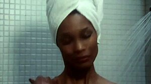 Ebony girl undresses in shower scene from Kolchak.