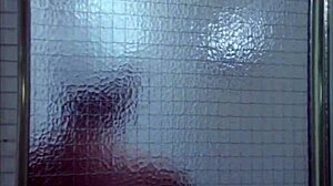 Ebony girl undresses in shower scene from Kolchak.