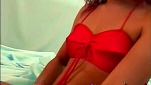 Marita in red bikini enjoys a relaxing session