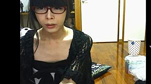 This Japanese shemale is masturbating her cock, what a sexy asian scene.