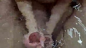 bath handjob ends with underwater cumshot pov