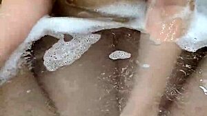 bath handjob ends with underwater cumshot pov