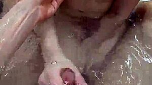bath handjob ends with underwater cumshot pov