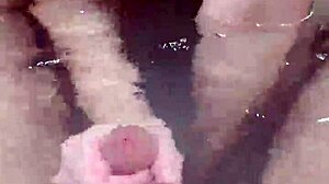 bath handjob ends with underwater cumshot pov