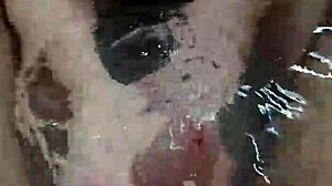 bath handjob ends with underwater cumshot pov