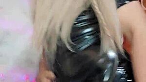The latex transsexual masturbates passionately.