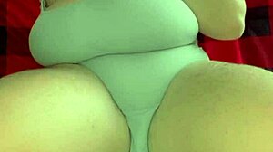 She rides in one piece for double penetration with dildo and muscular guy