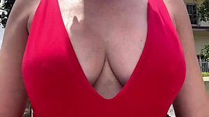The Italian MILF with big boobs walks outdoors, feeling incredibly horny. She indulges in her fetish desires.