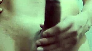 Shy skinny guy strokes his monster cock in the work bathroom