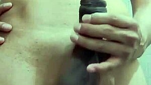 Shy skinny guy strokes his monster cock in the work bathroom