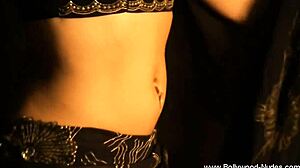 Beautiful nude bollywood chick undresses in erotic striptease