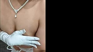 smoking wife in sexy stockings and lingerie pleasures her cunt with masturbation on webcam