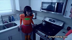 Busty Velma in costume throats and rides Fred's dick