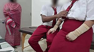 Students interacting in front of teacher at college