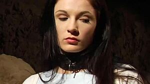 Bent over lesbian slave takes big black strapon deep in pussy.