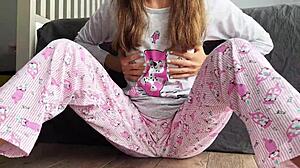 Does the teen in pajamas masturbate until she squirts?