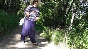 Hairy mature woman flashes her pussy under skirt at public park.