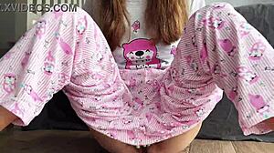 Does the teen in pajamas masturbate until she squirts?
