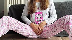 Does the teen in pajamas masturbate until she squirts?