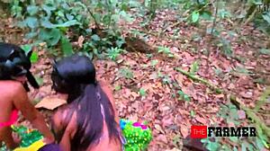 Two women engage in a playful cat fight on the farmer's ranch