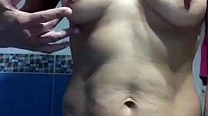 Spanish mature woman masturbates her big tits and pussy