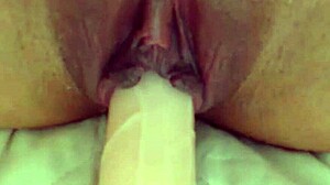 Angelina Grey's pussy up close as she slides in a big dildo, cums, and squirts