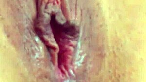 Angelina Grey's pussy up close as she slides in a big dildo, cums, and squirts