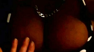 Is my ebony girl giving a titfuck to that black guy?